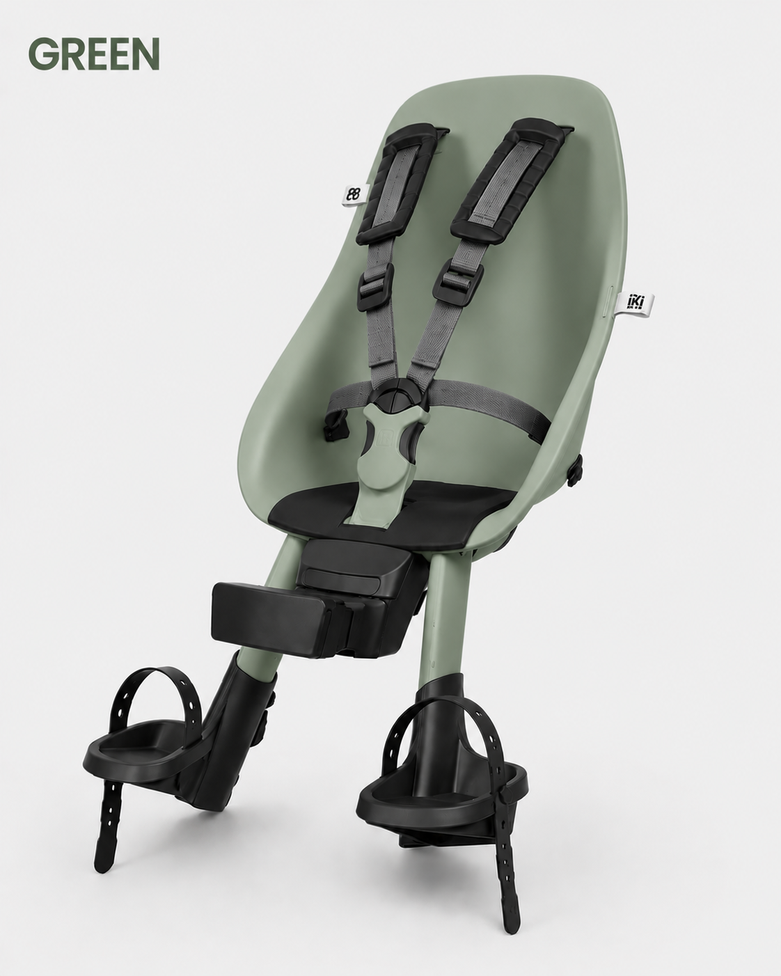 Green children's bike seat with black straps on a white background